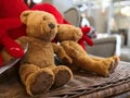Two teddy bears sit on a box Royalty Free Stock Photo
