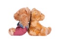 Two teddy bears, sitting back to back Royalty Free Stock Photo