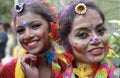 Two teen age girls smeared with holi colours in the Golf Green Central Park of Kolkata. Royalty Free Stock Photo