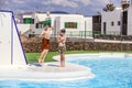 Two teen boys have fun at the pool Royalty Free Stock Photo