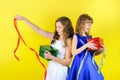 Two teen girls untie ribbons Royalty Free Stock Photo