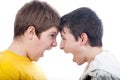 Two teenage boys screaming at each other Royalty Free Stock Photo