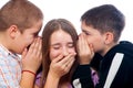 Two teenage boys telling jokes to teenage girl Royalty Free Stock Photo