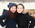 Two teenage girls close up winter portrait