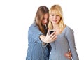 Two teenage girls photographing on camera Royalty Free Stock Photo