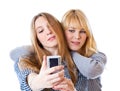 Two teenage girls photographing on camera Royalty Free Stock Photo