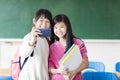 Two teenage girls student make selfie on the phone.