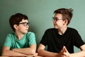 Two teenager boys in myopia glasses close up