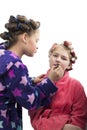 Two teenager girls playing Housewives, do yourself hairstyles and makeup having fun