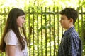 Two teenager siblings boy and girl close up photo