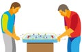 Two teenagers enthusiastically playing the game table hockey