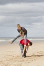 Two teenagers playing leapfrog Royalty Free Stock Photo