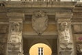 Two telamons adorning the entrance to the Lercari-Parodi Palace Palazzo Franco Lercari at Via Garibaldi in Genoa, Italy.
