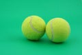 Two tennis balls on green Royalty Free Stock Photo