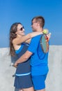 Two tennis players hugging looking each on other Royalty Free Stock Photo