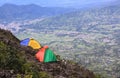 Two tents camping on mountain above valley Sumatra