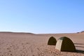 Two tents in what looks like no-mans-land i Royalty Free Stock Photo