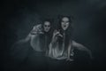 Two terrible ghost vampire on dark background Royalty Free Stock Photo