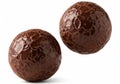 Two textured dark chocolate easter eggs with a cracked shell design isolated on white background Royalty Free Stock Photo