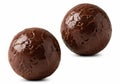 Two textured dark chocolate easter eggs with a glossy finish isolated on white background Royalty Free Stock Photo
