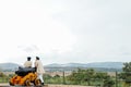 two soldiers stand at an ancient cannon