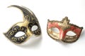 Two theater or mardi gras venetian masks on white background Royalty Free Stock Photo