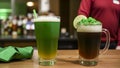 Two Themed Drinks On Bar Counter For Saint Patrick\'s Day: Green Layered Cocktail And Dark Beer
