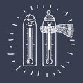 Two thermometers. Symbols of hot and cold weather. Royalty Free Stock Photo