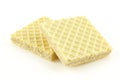 Two thin vanilla cream filled wafers isolated on white background Royalty Free Stock Photo