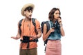 Two thoughtful tourists with binoculars and digital camera looking away Royalty Free Stock Photo