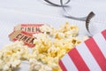 Two tickets and package popcorn in the cinema Royalty Free Stock Photo