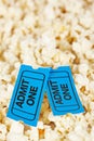 Two tickets on popcorn background