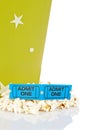 Two tickets and popcorn bucket Royalty Free Stock Photo