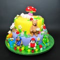 Two tier fondant cake for baptism celebration Royalty Free Stock Photo