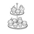 Two-tier serving tray with cupcakes. Plate with sweet dessert.