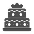 Two tiered birthday cake solid icon, Birthday cupcake concept, holiday cake sign on white background, sweet dessert icon Royalty Free Stock Photo