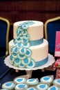 Two-tiered wedding cake with blue ribbons Royalty Free Stock Photo