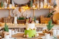 two-tiered white-green cake with balls, stars and teddy bear for birthday. Royalty Free Stock Photo