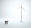 Two tiny engineers building a wind farm