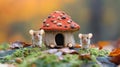 Two tiny mice in front of a mushroom house Royalty Free Stock Photo