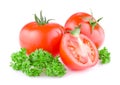 Two tomato cut in half and a sprig of parsley Royalty Free Stock Photo