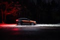 side view of Peugeot 3008 GT-line in night forest Royalty Free Stock Photo