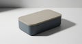 Two- Tone Rectangular Storage Box with Gray Blue Base and Beige Lid on White Surface container Royalty Free Stock Photo