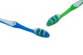 Two tooth brushes against a white background - image Royalty Free Stock Photo