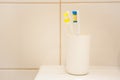 Two toothbrushes in the white box, bathroom Royalty Free Stock Photo