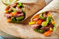 Two tortilla wraps with barbecued entrecote steak