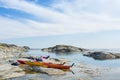 Two touring kayaks on a cliff Stockholm archipelago