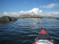 Two touring kayaks at Landsort lighthouse Stockholm archipelago Royalty Free Stock Photo