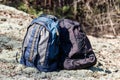 Two tourist backpacks on the glade in pine forest Royalty Free Stock Photo