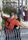 Two tourist kissing while making a selfie